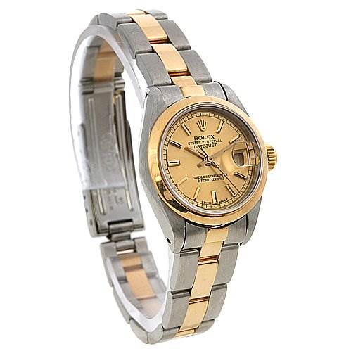 This image shows the Rolex Datejust 69163 Women's Stainless Steel Champagne Dial 69163 Women's Stainless Steel Champagne Dial watch at an angled view, highlighting its gold and silver parts, including the dial, bezel, and bracelet.