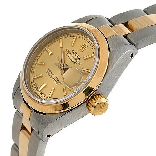 The image shows a side view of a Rolex Datejust 69163 Women's Stainless Steel Champagne Dial 69163 Women's Stainless Steel Champagne Dial watch highlighting its gold and stainless steel bracelet and crown.