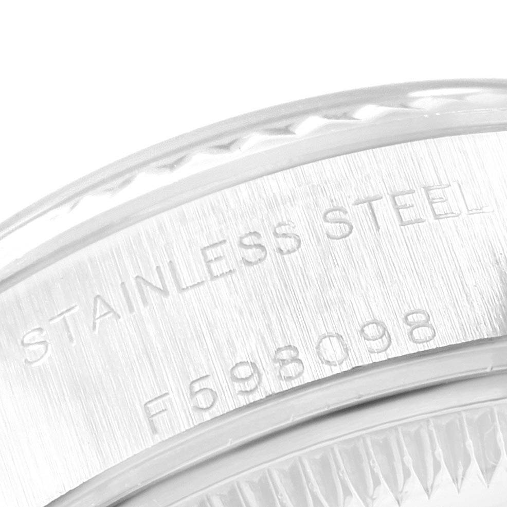 The image shows a close-up of the stainless steel case back with the serial number of a Rolex Datejust 79174 Women
s Stainless Steel Mother of Pearl Dial 79174 Women
s Stainless Steel Mother of Pearl Dial watch.