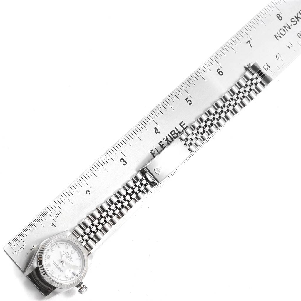 The image shows a Rolex Datejust 69174 Women's Stainless Steel White Dial 69174 Women's Stainless Steel White Dial watch, focusing on its face, bezel, and entire bracelet measured with a ruler.