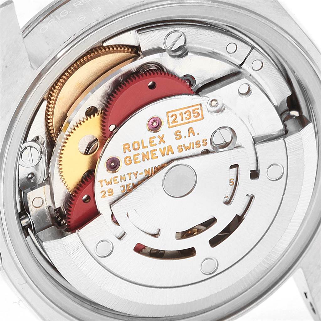 This is a close-up view of the internal mechanism of a Rolex Datejust 69174 Women's Stainless Steel White Dial 69174 Women's Stainless Steel White Dial watch.