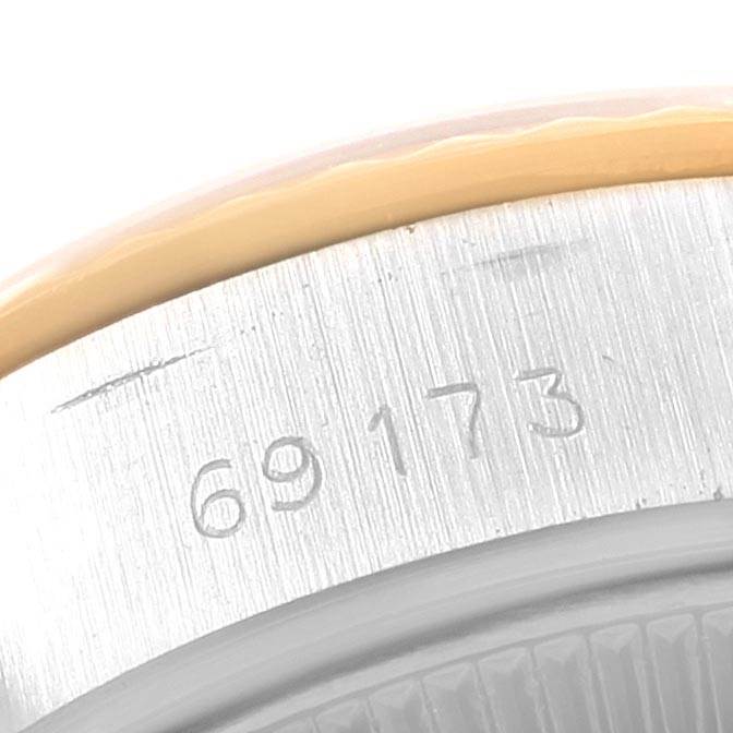 The image shows a close-up of the model number engraved on the back of the case of a Rolex Datejust 69173 Women's Stainless Steel Champagne Dial 69173 Women's Stainless Steel Champagne Dial watch.