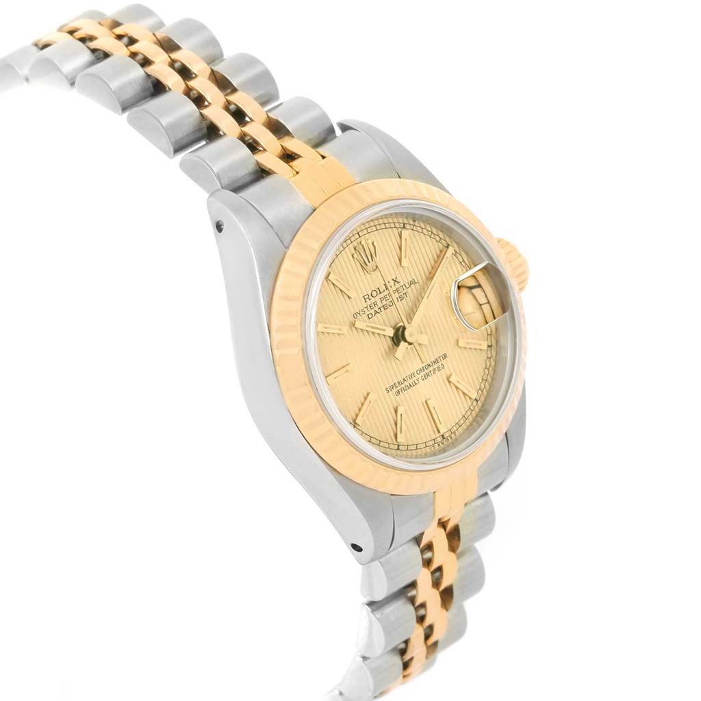 The image shows a side angle of a Rolex Datejust 69173 Women's Stainless Steel Champagne Dial 69173 Women's Stainless Steel Champagne Dial watch, highlighting its two-tone bracelet and champagne dial.