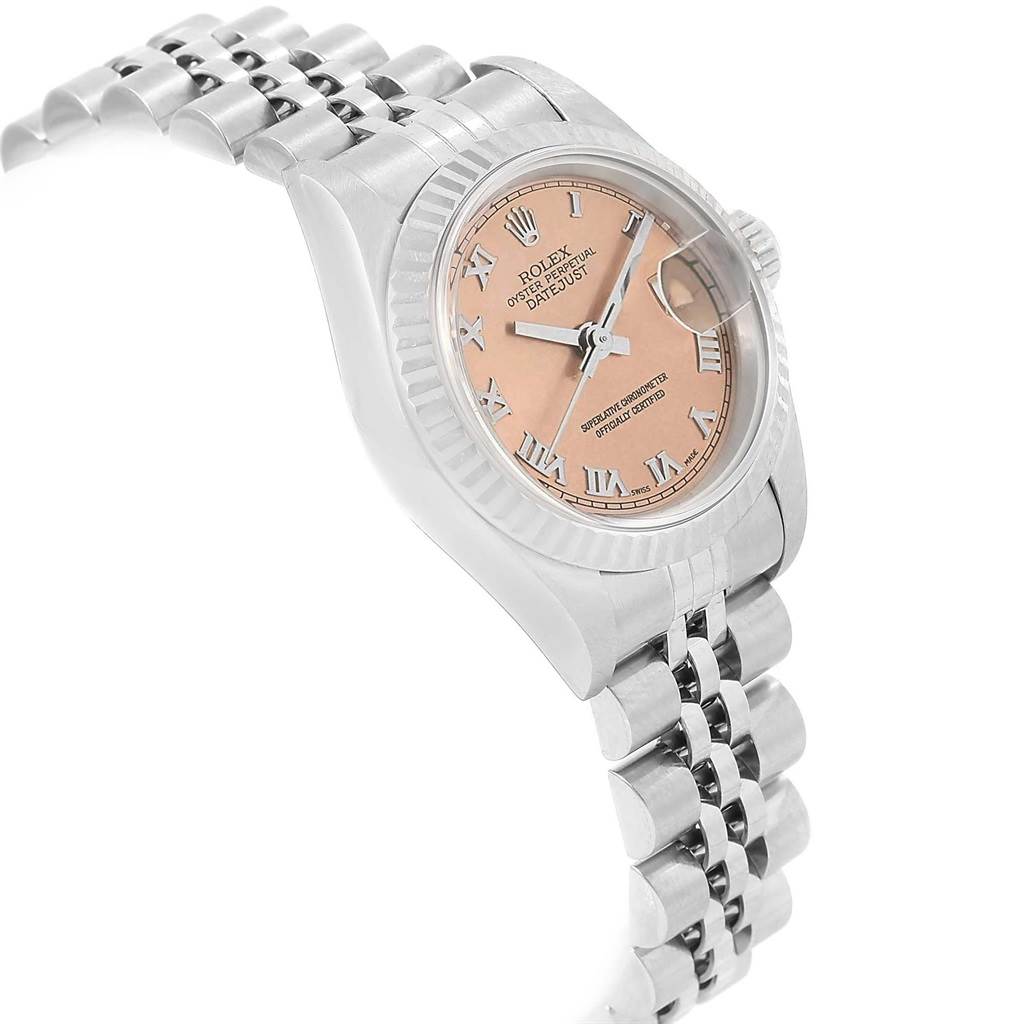 The image shows a Rolex Datejust 79174 Women's Stainless Steel Pink Dial 79174 Women's Stainless Steel Pink Dial watch at a side angle, highlighting its dial, bezel, and part of the bracelet.