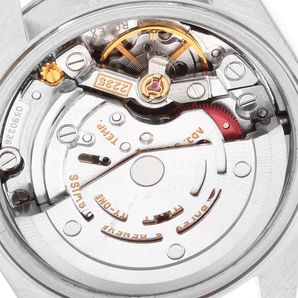 This image shows the intricate internal mechanism of a Rolex Datejust 79174 Women's Stainless Steel Pink Dial 79174 Women's Stainless Steel Pink Dial watch from a close-up view.