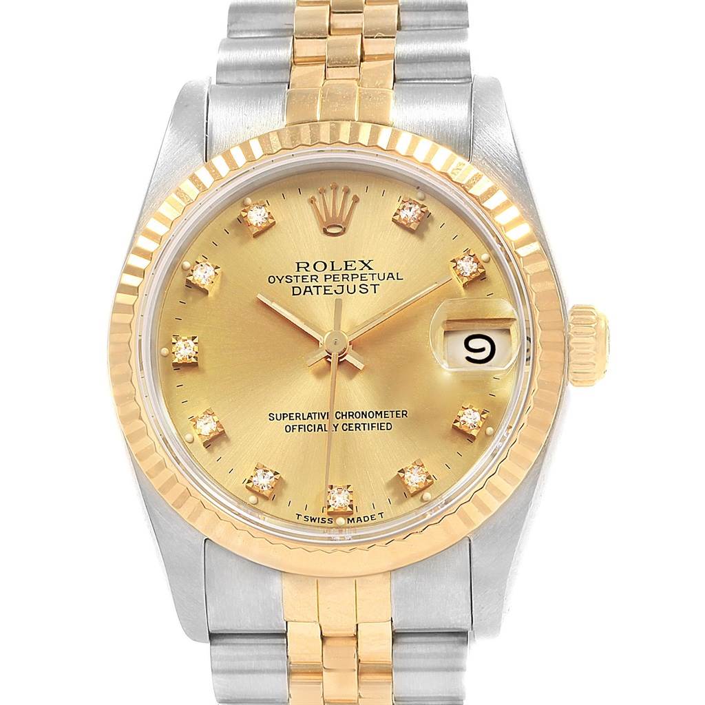 This image shows a frontal view of a Rolex Datejust 68273 Women's Steel and Gold (two tone) Champagne Dial 68273 Women's Steel and Gold (two tone) Champagne Dial watch, highlighting its gold dial, bezel, and two-tone bracelet.