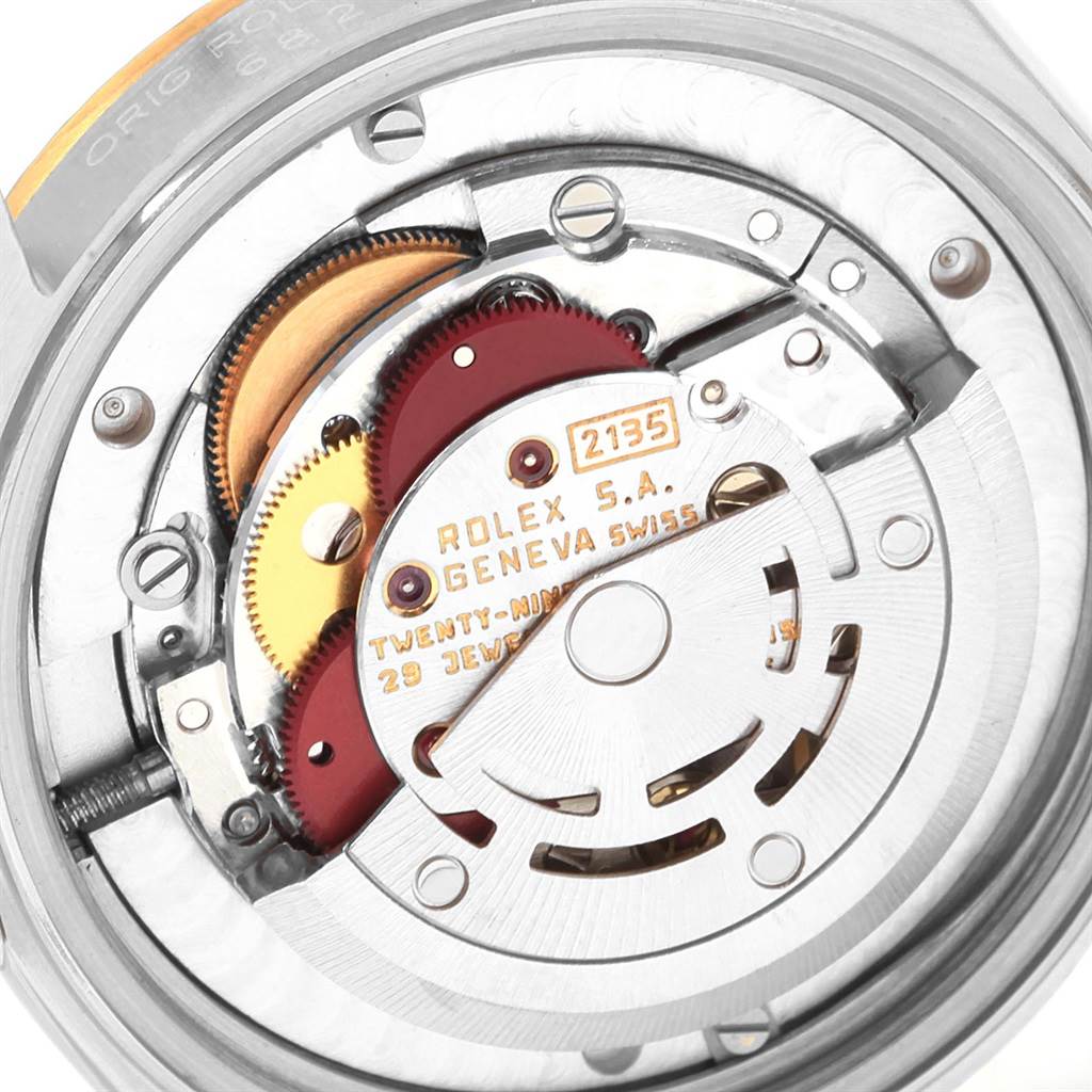 The image shows an angled close-up of the Rolex Datejust 68273 Women's Steel and Gold (two tone) Champagne Dial 68273 Women's Steel and Gold (two tone) Champagne Dial model's internal mechanical movement components.