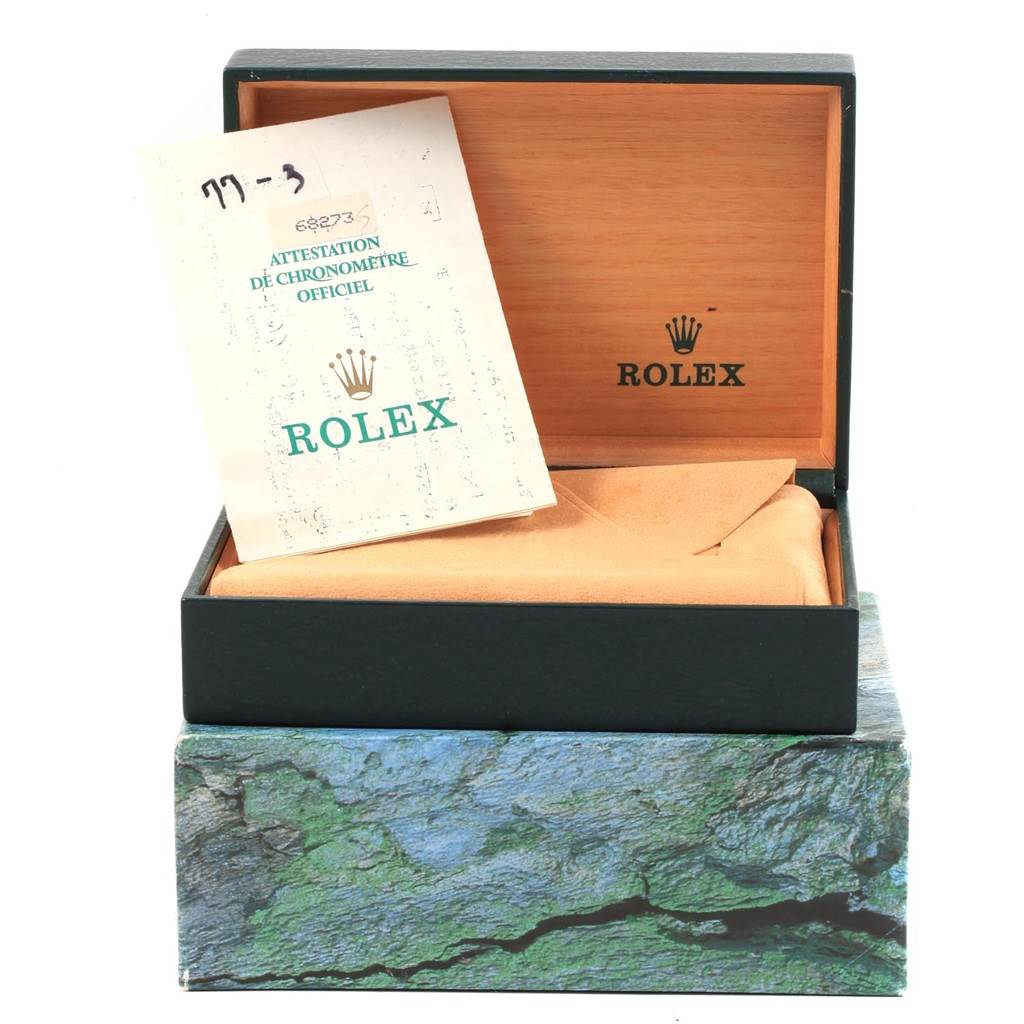 The image shows a Rolex Datejust 68273 Women's Steel and Gold (two tone) Champagne Dial 68273 Women's Steel and Gold (two tone) Champagne Dial watch box and certificate from a front angle.