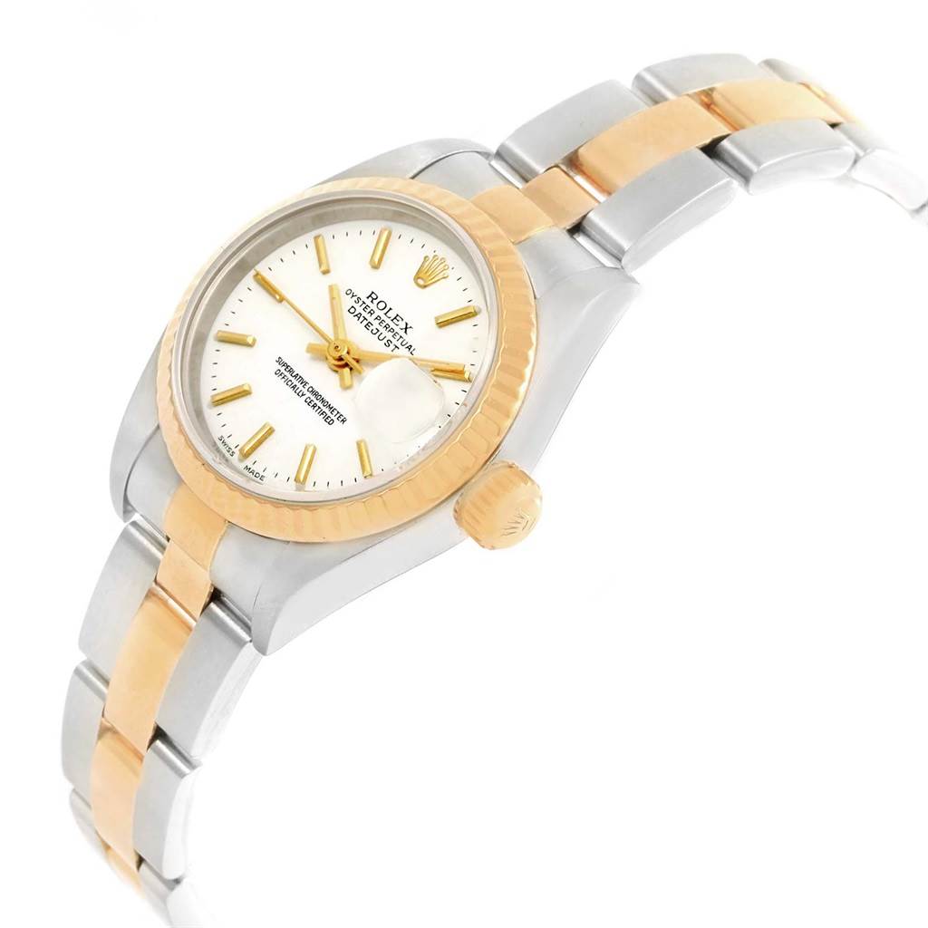This image shows a Rolex Datejust 79173 Women's Steel and Gold (two tone) White Dial 79173 Women's Steel and Gold (two tone) White Dial watch at an angled side view, highlighting the dial, bezel, crown, and two-tone bracelet.