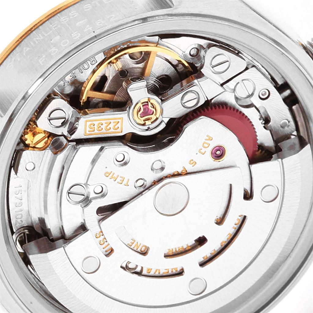 This image shows a close-up view of the movement mechanism inside a Rolex Datejust 79173 Women's Steel and Gold (two tone) White Dial 79173 Women's Steel and Gold (two tone) White Dial watch.