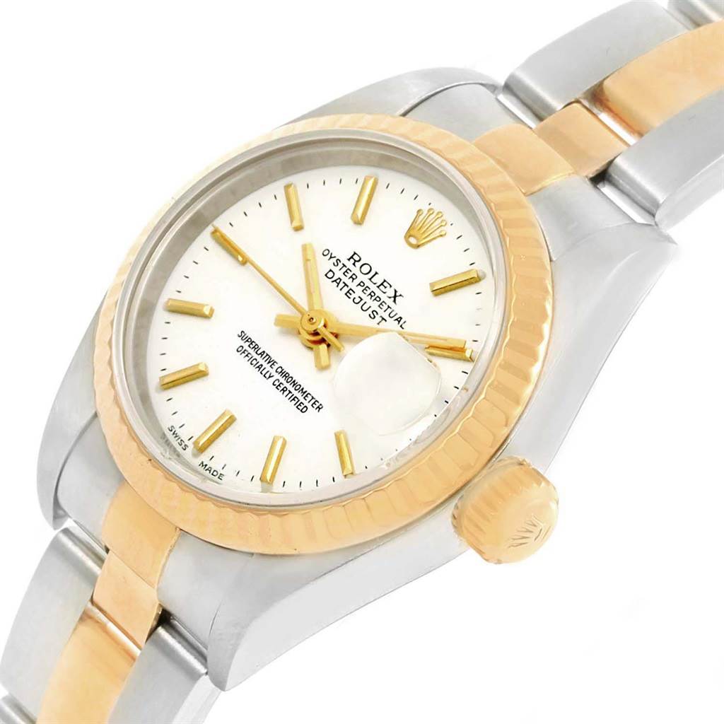 The image shows a close-up of a Rolex Datejust 79173 Women's Steel and Gold (two tone) White Dial 79173 Women's Steel and Gold (two tone) White Dial watch, highlighting the dial, bezel, crown, and bracelet.