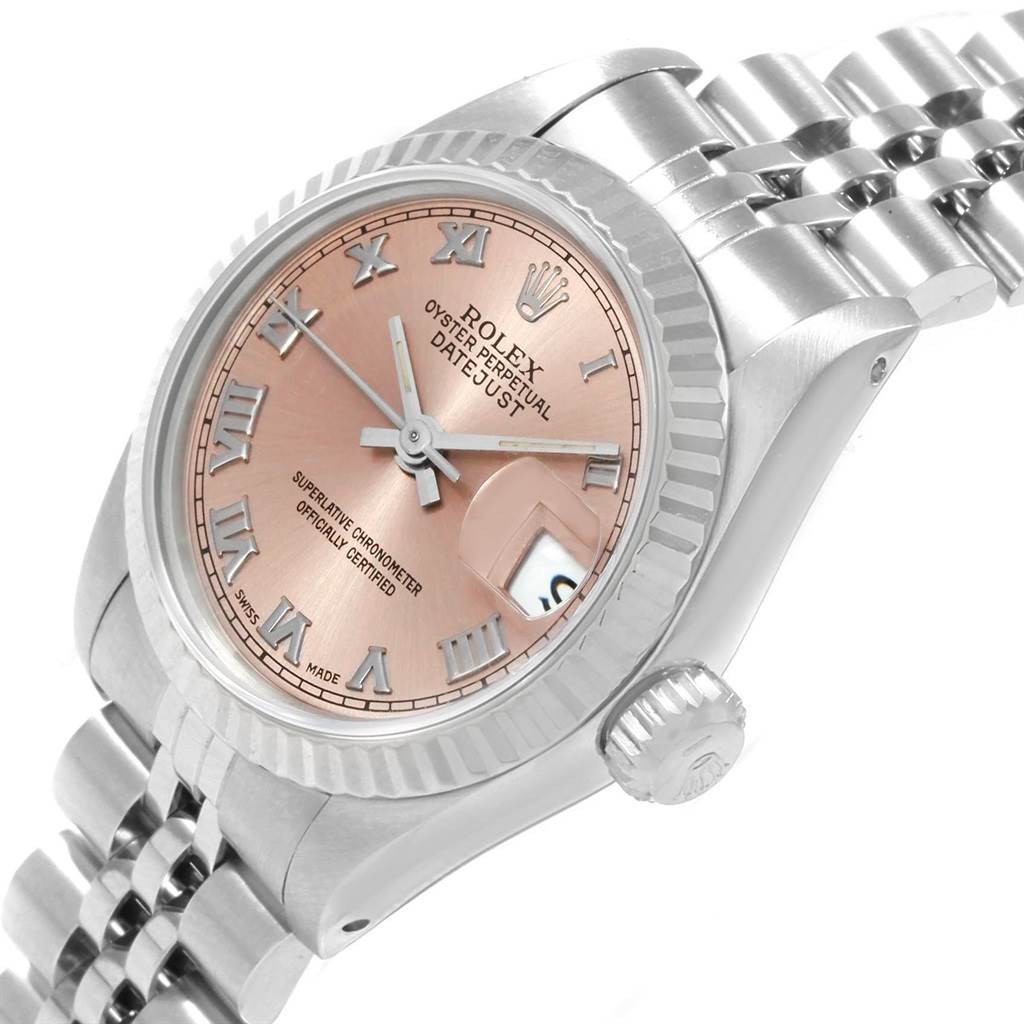The Rolex Datejust 69174 Women
s Stainless Steel Pink Dial 69174 Women
s Stainless Steel Pink Dial watch is shown at a slight angle, displaying the dial, bezel, crown, and part of the bracelet.