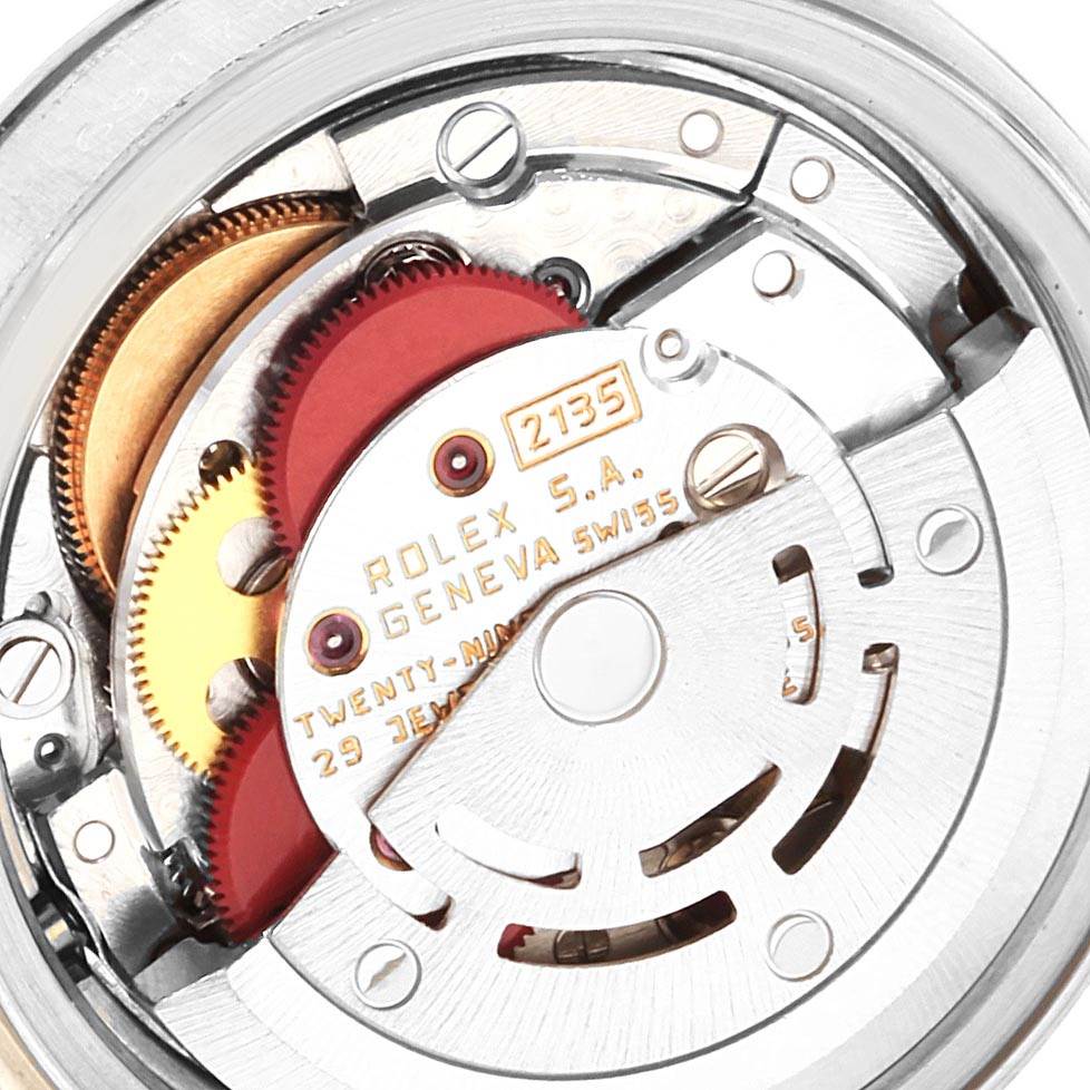This image shows the movement mechanism of the Rolex Datejust 69174 Women
s Stainless Steel Blue Dial 69174 Women
s Stainless Steel Blue Dial watch, visible from the back.