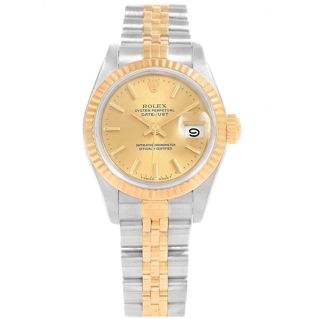 This image shows a Rolex Datejust 69173 Women's Stainless Steel Champagne Dial 69173 Women's Stainless Steel Champagne Dial watch from the front, highlighting its gold dial, fluted bezel, and two-tone bracelet.