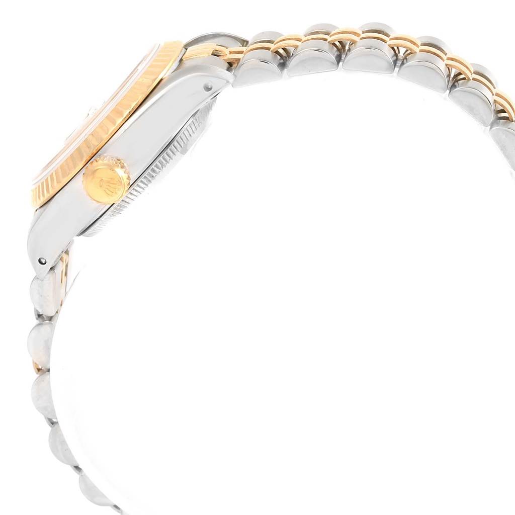 The image shows a side view of a Rolex Datejust 69173 Women's Stainless Steel Champagne Dial 69173 Women's Stainless Steel Champagne Dial watch, highlighting the crown, case, and part of the bracelet.