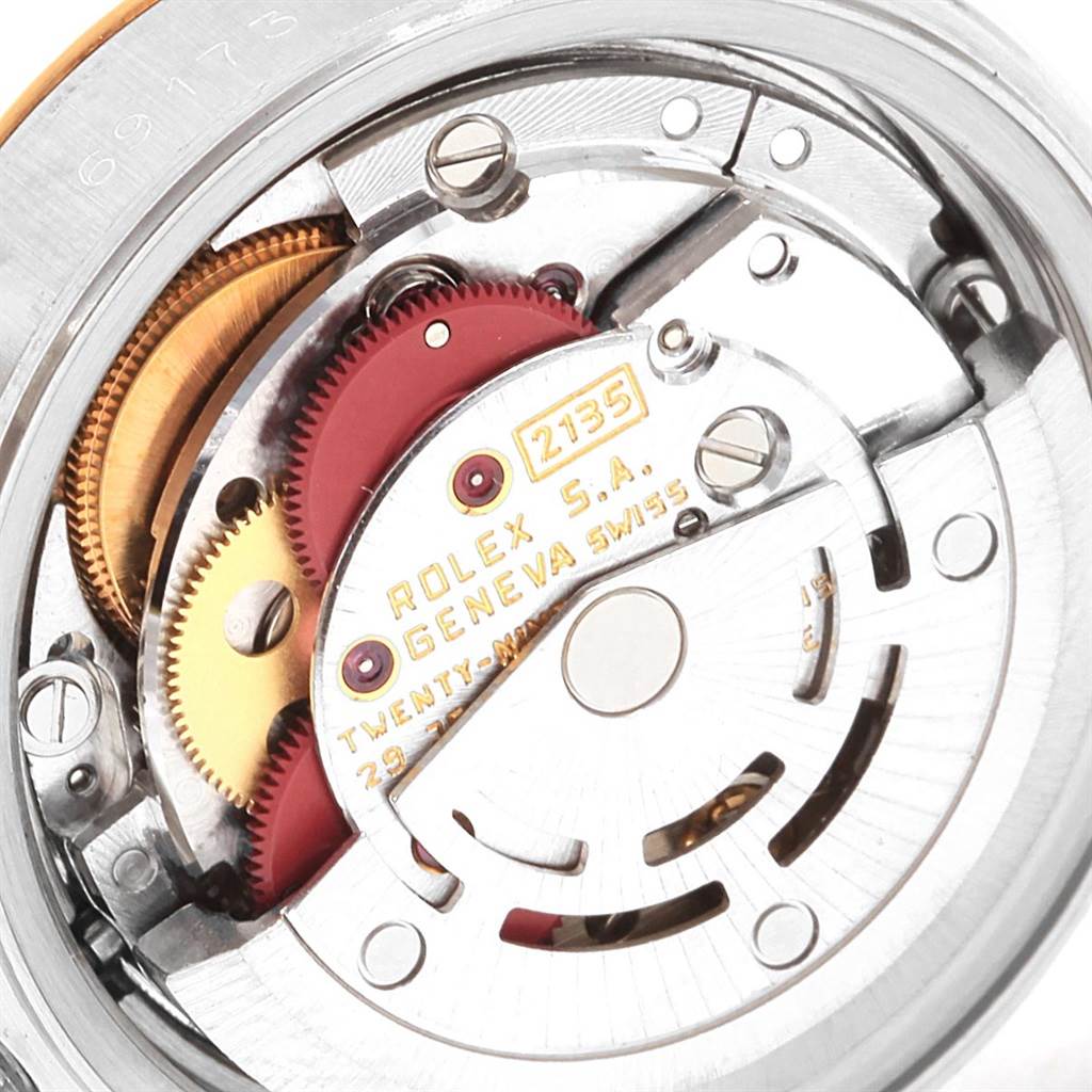 The image shows a close-up of the movement and internal mechanisms of a Rolex Datejust 69173 Women's Stainless Steel Champagne Dial 69173 Women's Stainless Steel Champagne Dial watch.