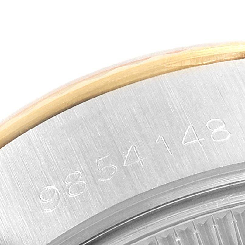 This is a close-up of the serial number and bezel of a Rolex Datejust 69173 Women's Stainless Steel Champagne Dial 69173 Women's Stainless Steel Champagne Dial watch.