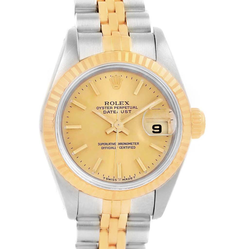 The Rolex 69173 Men's Stainless Steel Champagne Dial 69173 Men's Stainless Steel Champagne Dial Datejust 26mm Steel 18K Yellow Gold Ladies Watch 69173 is shown from a front angle, highlighting its dial and bezel.