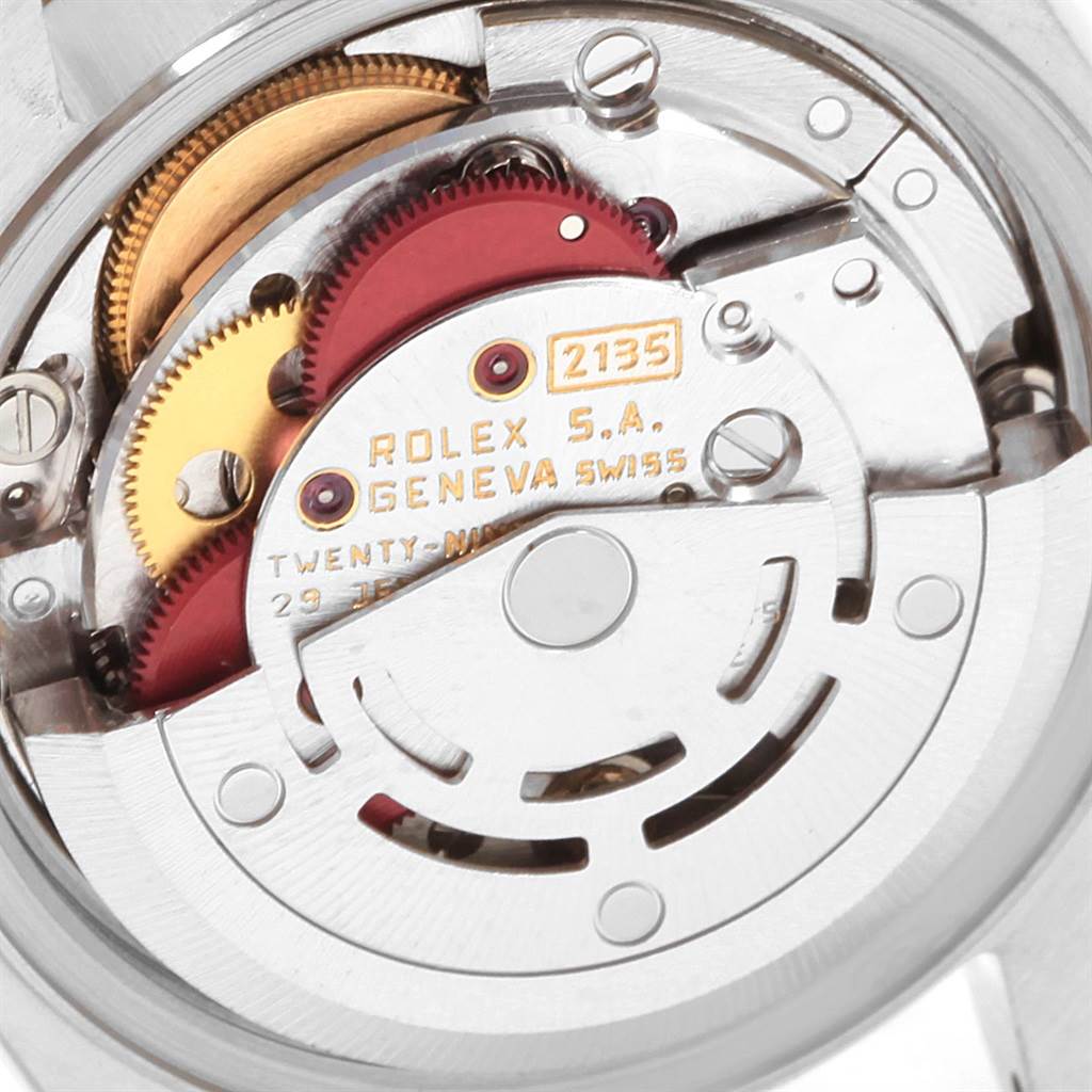 This image shows a close-up view of the movement mechanism inside a Rolex 69173 Men's Stainless Steel Champagne Dial 69173 Men's Stainless Steel Champagne Dial Datejust 26mm Steel 18K Yellow Gold Ladies Watch 69173 model.