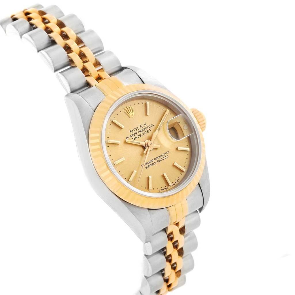 The image shows a side angle of the Rolex 69173 Men's Stainless Steel Champagne Dial 69173 Men's Stainless Steel Champagne Dial Datejust 26mm Steel 18K Yellow Gold Ladies Watch 69173, highlighting its face, bezel, and bracelet.