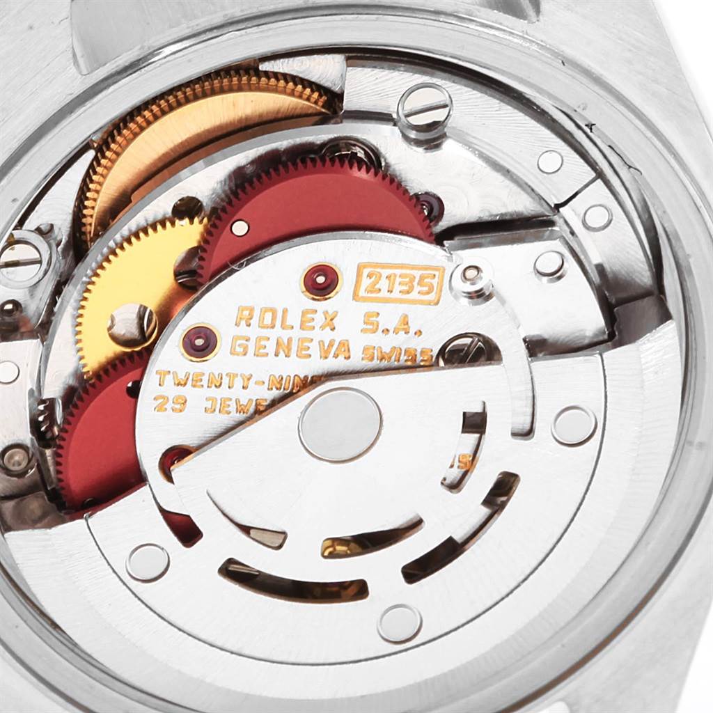 The image shows the intricate internal mechanisms of a Rolex Datejust 69174 Women's Stainless Steel Silver Dial 69174 Women's Stainless Steel Silver Dial watch from a top-down angle.