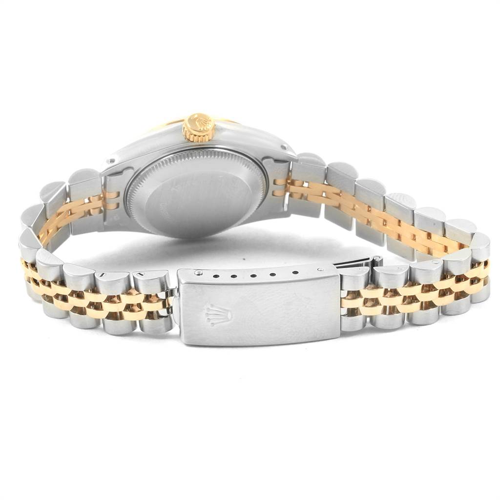 This image shows the back side of the Rolex Datejust 69173 Women's Stainless Steel Champagne Dial 69173 Women's Stainless Steel Champagne Dial watch, focusing on the case back and two-tone jubilee bracelet.