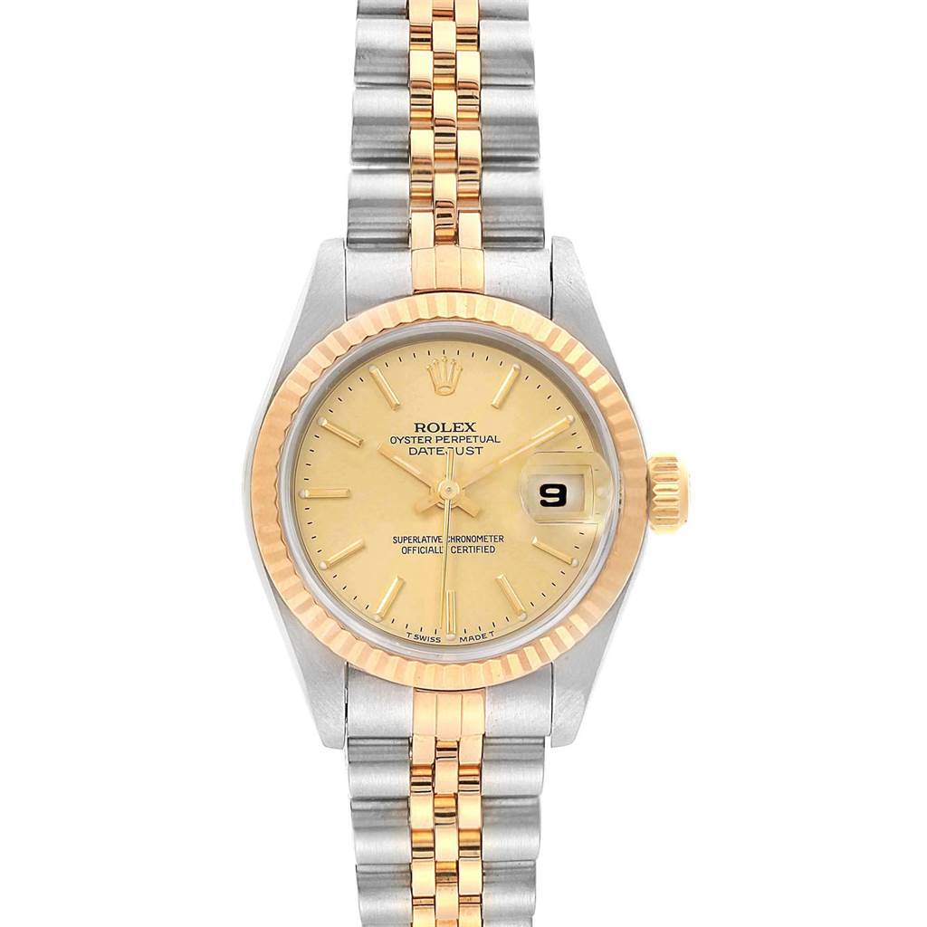 A front view of a Rolex Datejust 69173 Women's Stainless Steel Champagne Dial 69173 Women's Stainless Steel Champagne Dial watch, showing its dial, date window, jubilee bracelet, and fluted bezel.