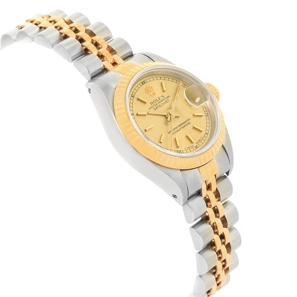 This image shows a Rolex Datejust 69173 Women's Stainless Steel Champagne Dial 69173 Women's Stainless Steel Champagne Dial watch at an angled view, highlighting the gold dial, bezel, and two-tone bracelet.