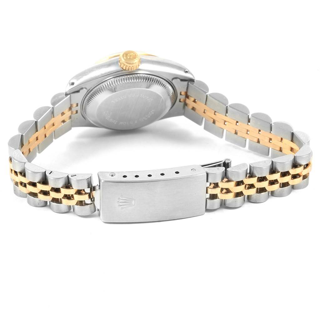 This image shows the back view of a Rolex Datejust 69173 Women
s Stainless Steel Champagne Dial 69173 Women
s Stainless Steel Champagne Dial watch focusing on the clasp, bracelet, and case back.