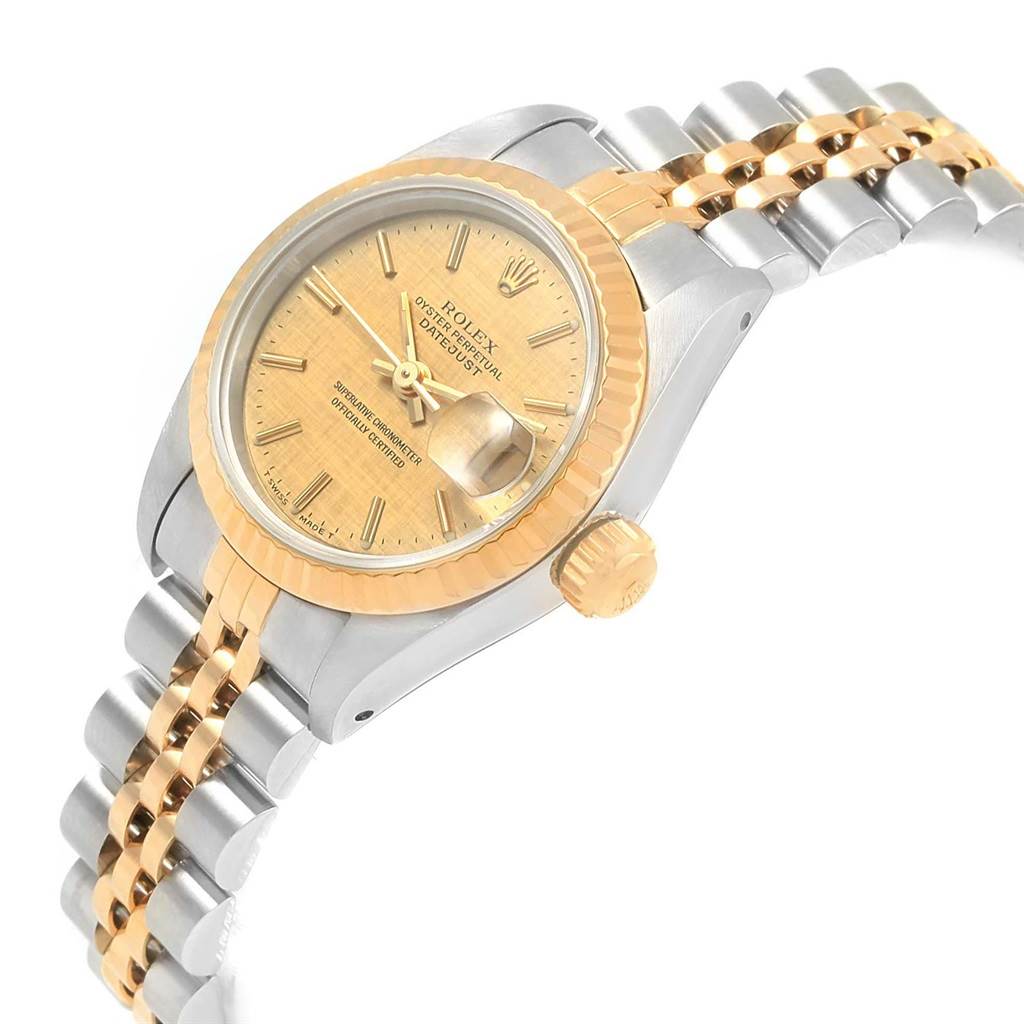 The image shows a Rolex Datejust 69173 Women
s Stainless Steel Champagne Dial 69173 Women
s Stainless Steel Champagne Dial watch from a slightly angled top view, highlighting the bezel, dial, crown, and bracelet.