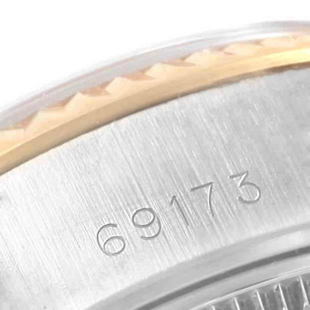 This image shows a close-up of the watch case and bezel of a Rolex Datejust 69173 Women
s Stainless Steel Champagne Dial 69173 Women
s Stainless Steel Champagne Dial model with the reference number 69173.
