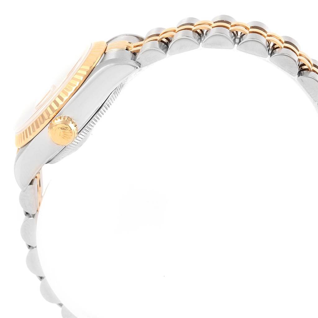 The image shows a side view of a Rolex Datejust 69173 Women's Stainless Steel Champagne Dial 69173 Women's Stainless Steel Champagne Dial watch, focusing on the case, fluted bezel, and part of the bracelet.