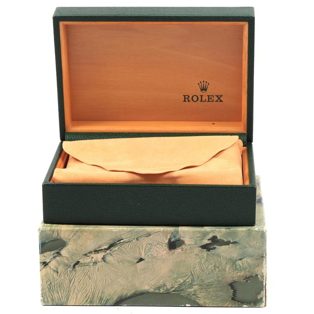 This image shows the open box and protective pouch of a Rolex Datejust 68273 Women's Steel and Gold (two tone) Champagne Dial 68273 Women's Steel and Gold (two tone) Champagne Dial watch from a front angle.