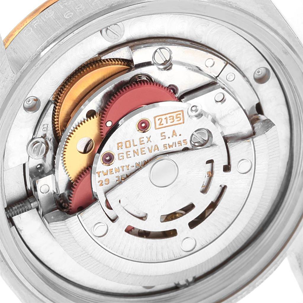 The image shows a close-up view of the movement mechanism of a Rolex Datejust 68273 Women's Steel and Gold (two tone) Champagne Dial 68273 Women's Steel and Gold (two tone) Champagne Dial watch.