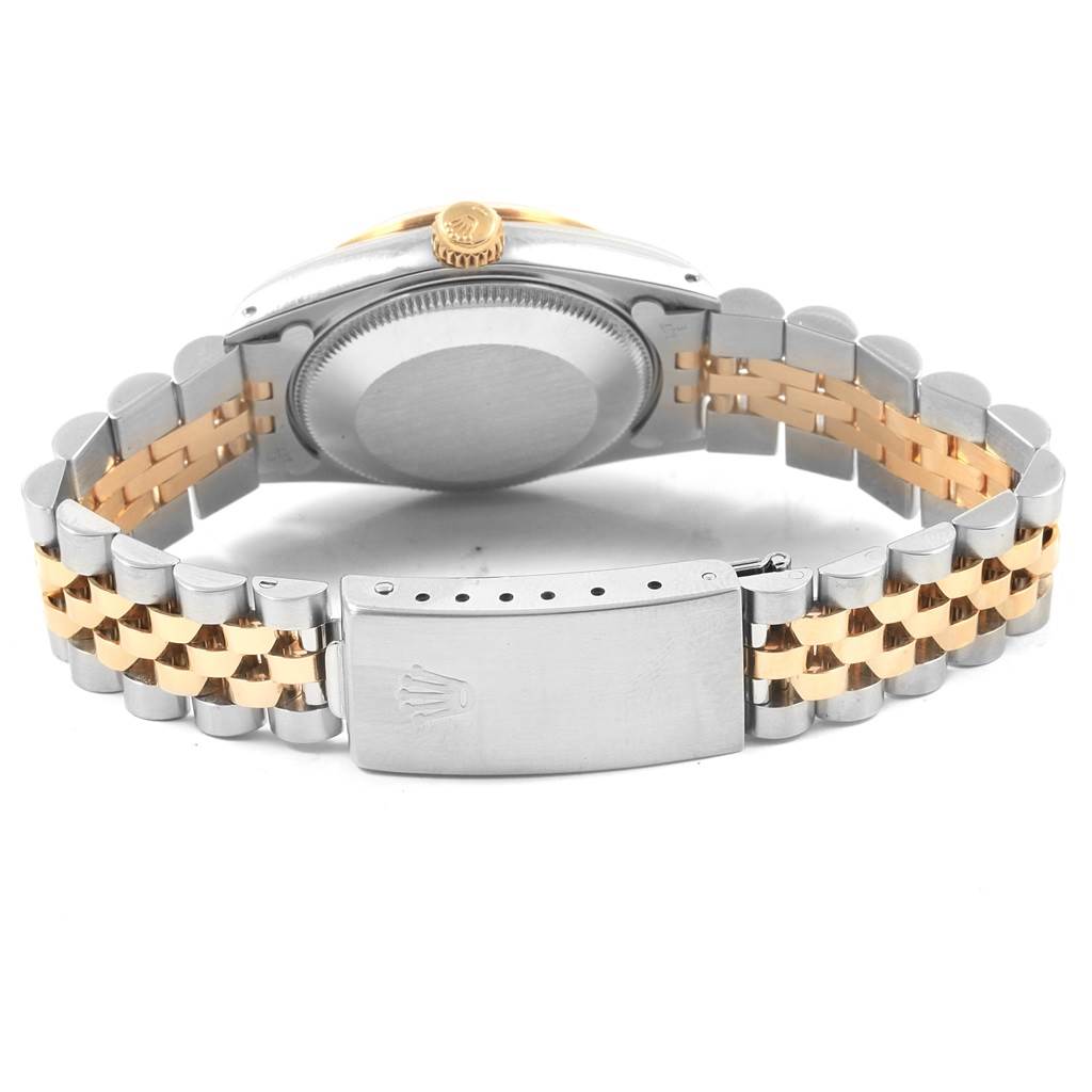 The image shows the back of a Rolex Datejust 68273 Women's Steel and Gold (two tone) Champagne Dial 68273 Women's Steel and Gold (two tone) Champagne Dial model, focusing on the case back, crown, and two-tone bracelet with clasp.