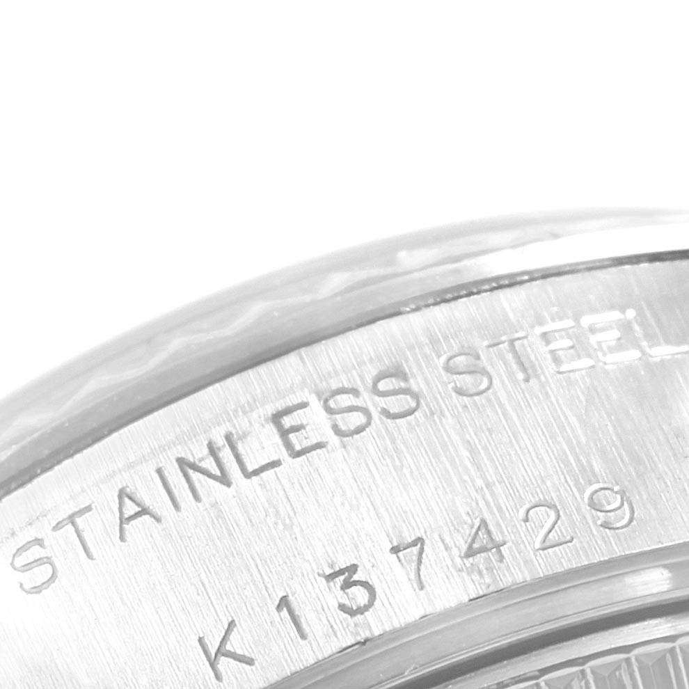 This image shows a close-up of the stainless steel back casing of a Rolex Datejust 79174 Women
s Stainless Steel Silver Dial 79174 Women
s Stainless Steel Silver Dial watch.