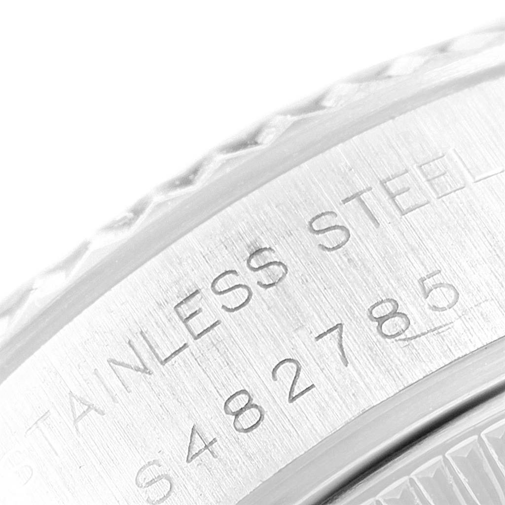 This is a close-up of the engravings on the stainless steel case of the Rolex Datejust 69174 Women
s Stainless Steel Pink Dial 69174 Women
s Stainless Steel Pink Dial watch.