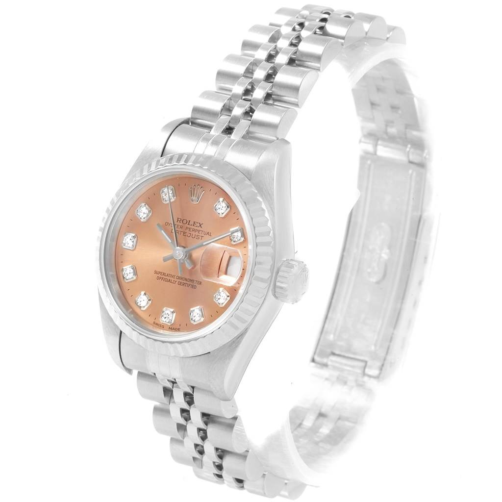 The image shows a Rolex Datejust 69174 Women
s Stainless Steel Pink Dial 69174 Women
s Stainless Steel Pink Dial watch at an angled view, highlighting its face, bezel, crown, and jubilee bracelet.