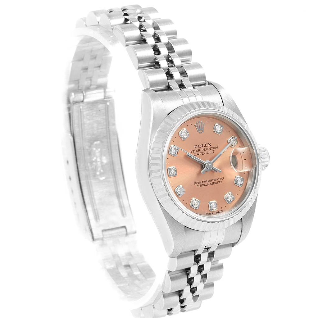 This image shows a Rolex Datejust 69174 Women
s Stainless Steel Pink Dial 69174 Women
s Stainless Steel Pink Dial watch angled to display its face, bezel, and partially open Jubilee bracelet.