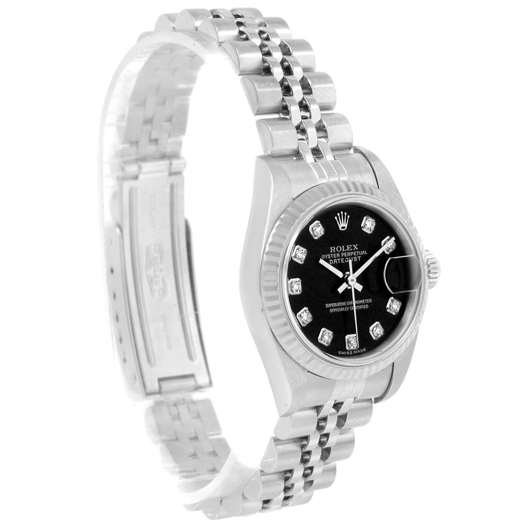 The image shows a side angle of a Rolex Datejust 79174 Women's Stainless Steel Black Dial 79174 Women's Stainless Steel Black Dial watch, highlighting its black dial, fluted bezel, and Jubilee bracelet.