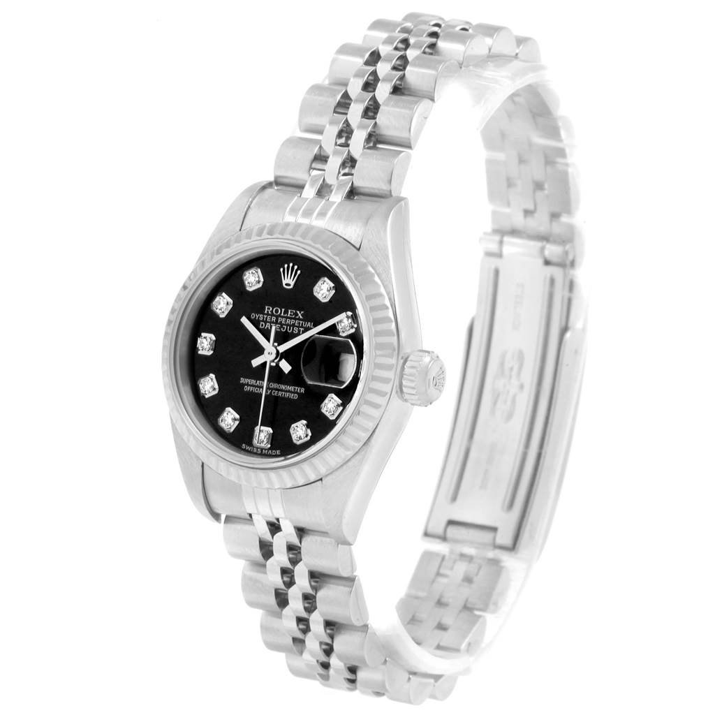 The Rolex Datejust 79174 Women's Stainless Steel Black Dial 79174 Women's Stainless Steel Black Dial watch is shown at an angle, displaying its face, crown, and part of its Jubilee bracelet.