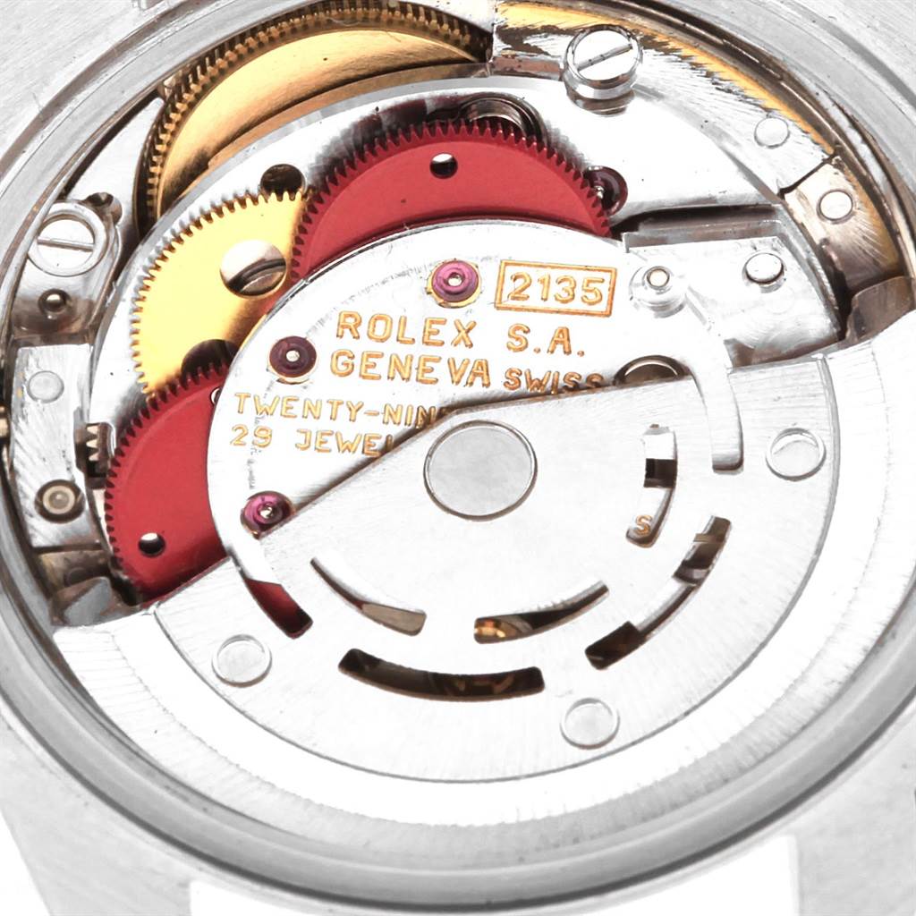 This image shows the internal mechanism and movement of a Rolex Datejust 69174 Women
s Stainless Steel Silver Dial 69174 Women
s Stainless Steel Silver Dial watch at a close-up angle.