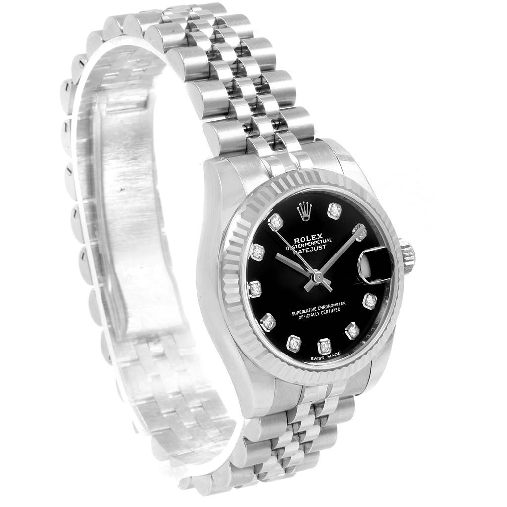 The Rolex Datejust 178274 Women's Stainless Steel Black Dial 178274 Women's Stainless Steel Black Dial watch is shown at a slight angle, highlighting its black dial, fluted bezel, and Jubilee bracelet.
