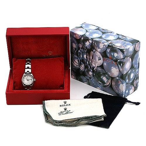 This image shows a Rolex Datejust 79174 Women's Stainless Steel Silver Dial 79174 Women's Stainless Steel Silver Dial watch in its box, along with the outer packaging and cleaning cloths.
