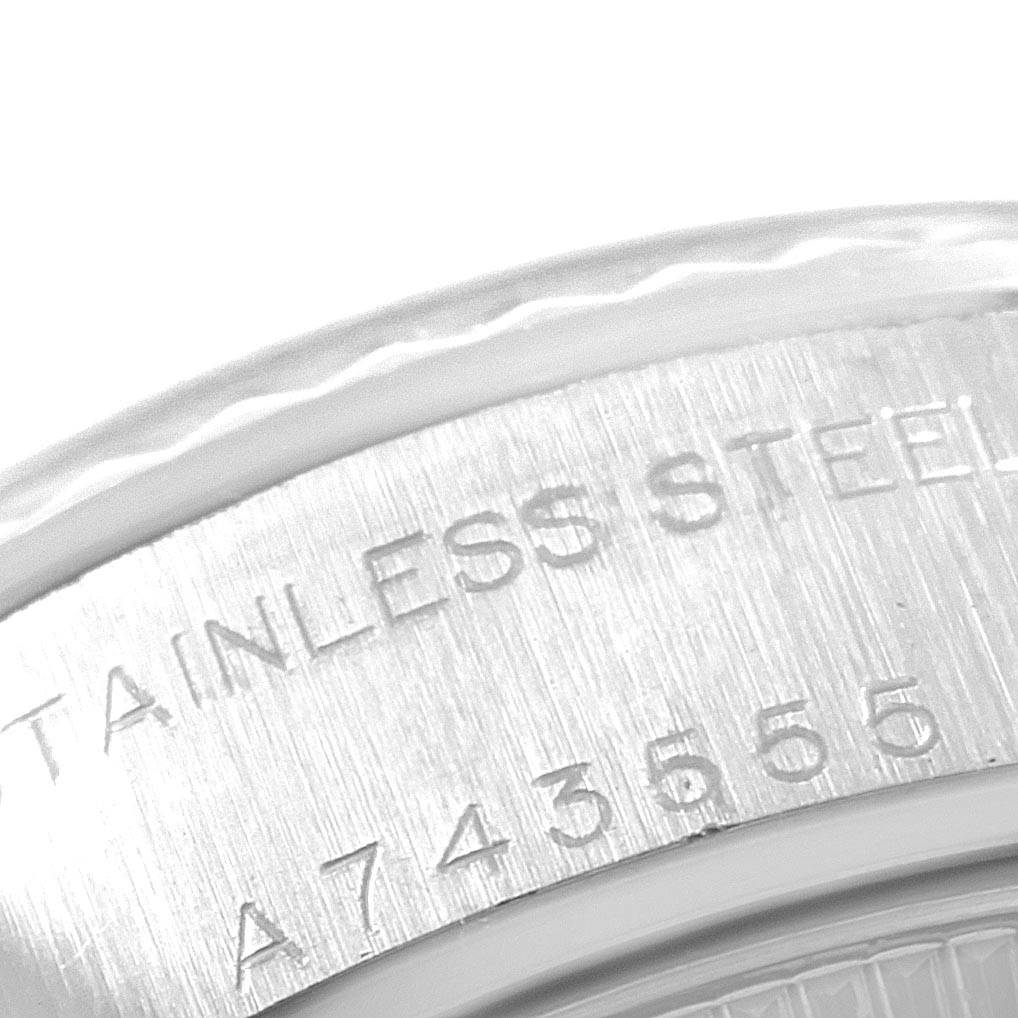 This image shows a close-up view of the case back with part of the serial number and "Stainless Steel" engraving on a Rolex Datejust 79174 Women's Stainless Steel Silver Dial 79174 Women's Stainless Steel Silver Dial watch.