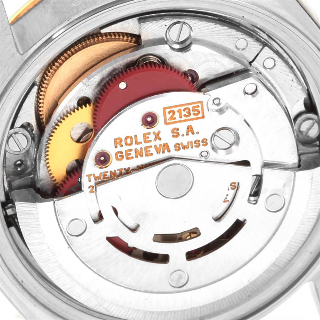 Close-up of the Rolex Datejust 69173 Women's Stainless Steel Champagne Dial 69173 Women's Stainless Steel Champagne Dial watch movement, showing intricate gears and components.