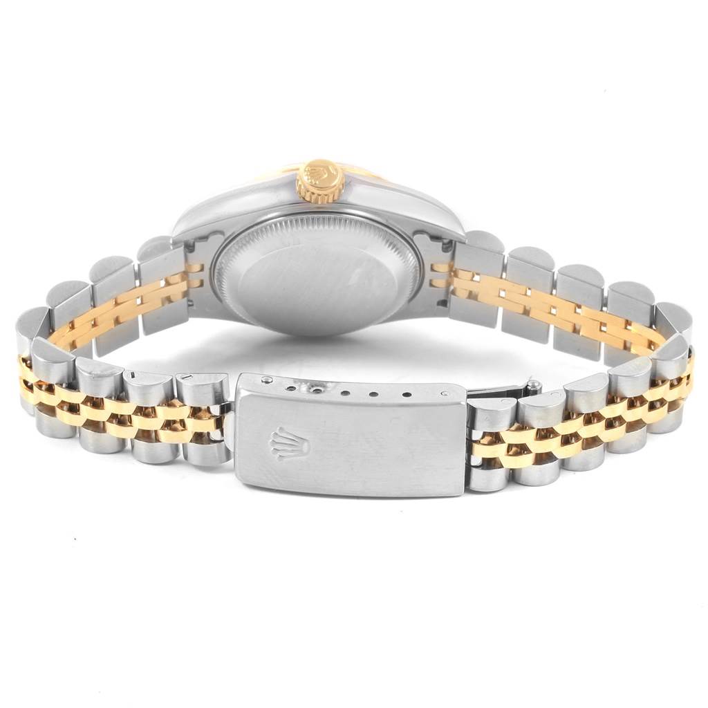 This image shows the backside of a Rolex Datejust 69173 Women's Stainless Steel Champagne Dial 69173 Women's Stainless Steel Champagne Dial watch, highlighting its clasp, bracelet, and case back.