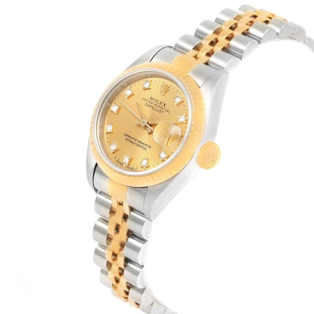 The image shows a Rolex Datejust 69173 Women's Stainless Steel Champagne Dial 69173 Women's Stainless Steel Champagne Dial watch at an angled view, highlighting its gold dial, diamond markers, and two-tone bracelet.
