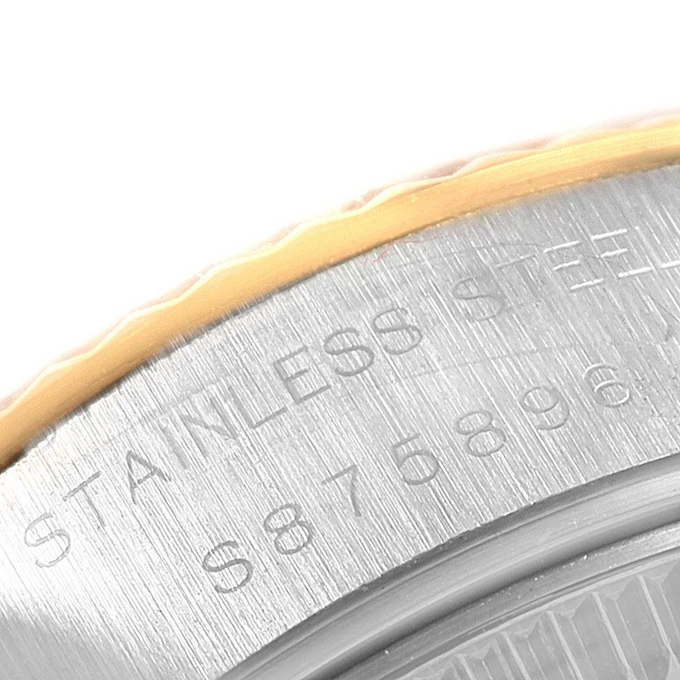 This close-up image shows the engraved details on the back casing of a Rolex Datejust 69173 Women's Stainless Steel Champagne Dial 69173 Women's Stainless Steel Champagne Dial watch.