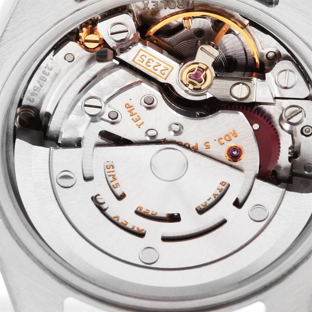 The image shows the intricate movement and internal mechanics of a Rolex Datejust 179173 Women's Steel and Gold (two tone) Silver Dial 179173 Women's Steel and Gold (two tone) Silver Dial watch.